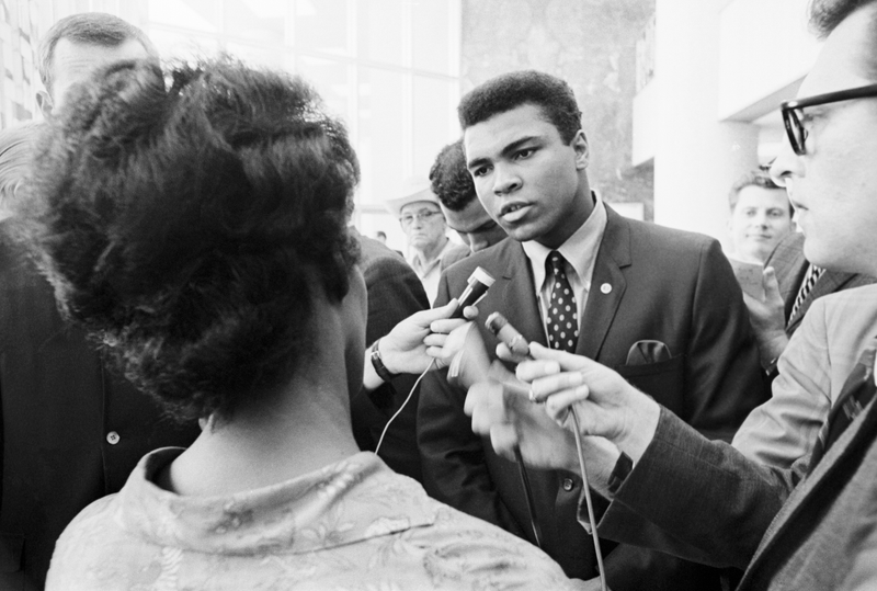 Muhammad Ali talking with the press after being indicted by a federal grand jury for his refusal to be inducted into the armed forces.Getty Images